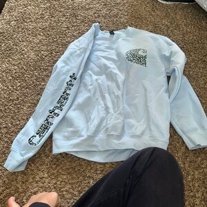 Carhartt Light Blue Crewneck Sweatshirt with Leopard Logo